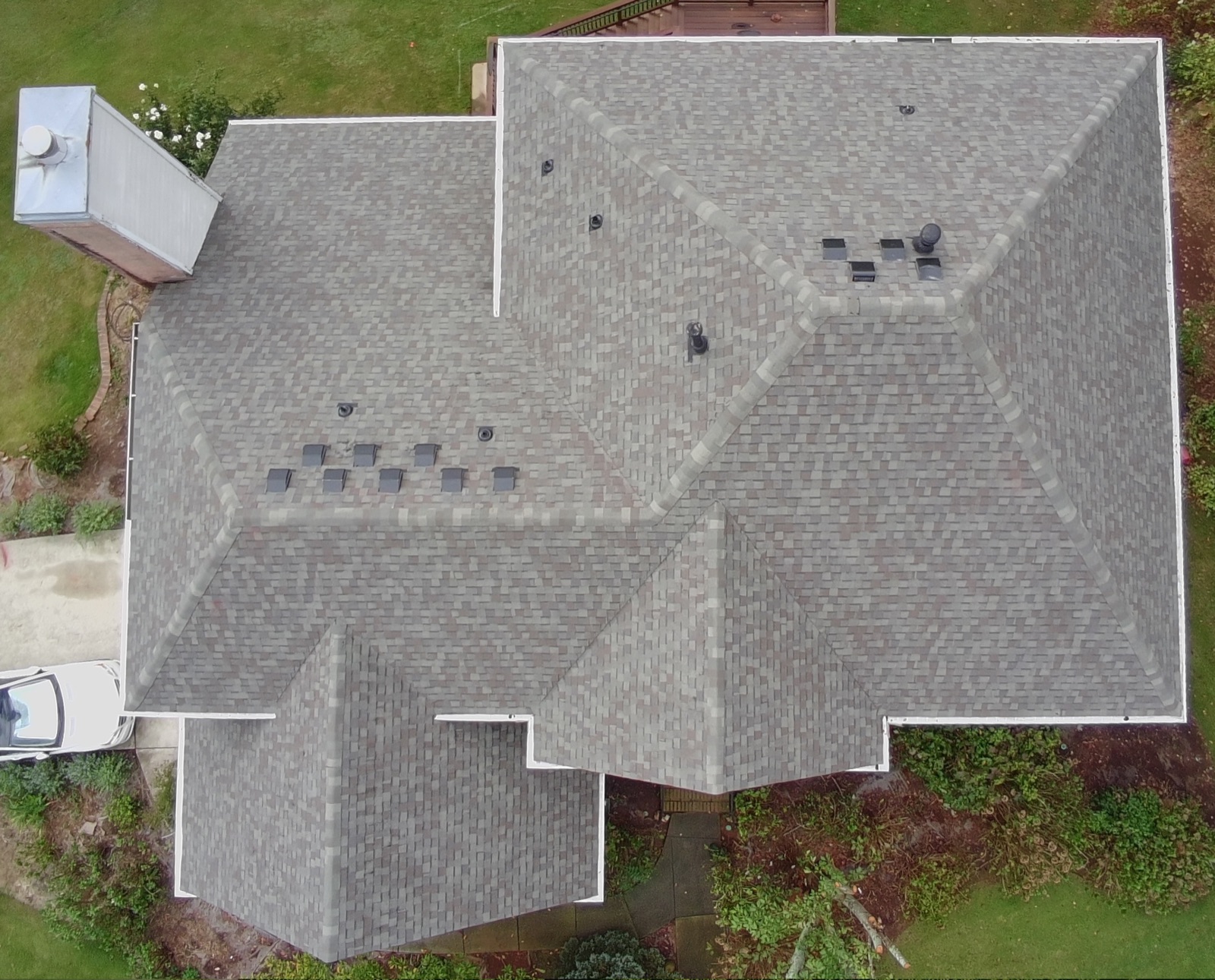 Finished roof with new architectural shingles, aerial view